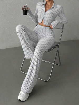 Set deportivo de dos piezas chaqueta manga larga y pantalón largo acampanado