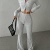 Set deportivo de dos piezas chaqueta manga larga y pantalón largo acampanado - Image 2
