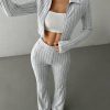 Set deportivo de dos piezas chaqueta manga larga y pantalón largo acampanado - Image 3