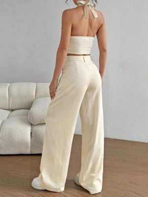 Set de dos piezas top con escote en pecho y espalda de botones y pantalon largo tipo cargo